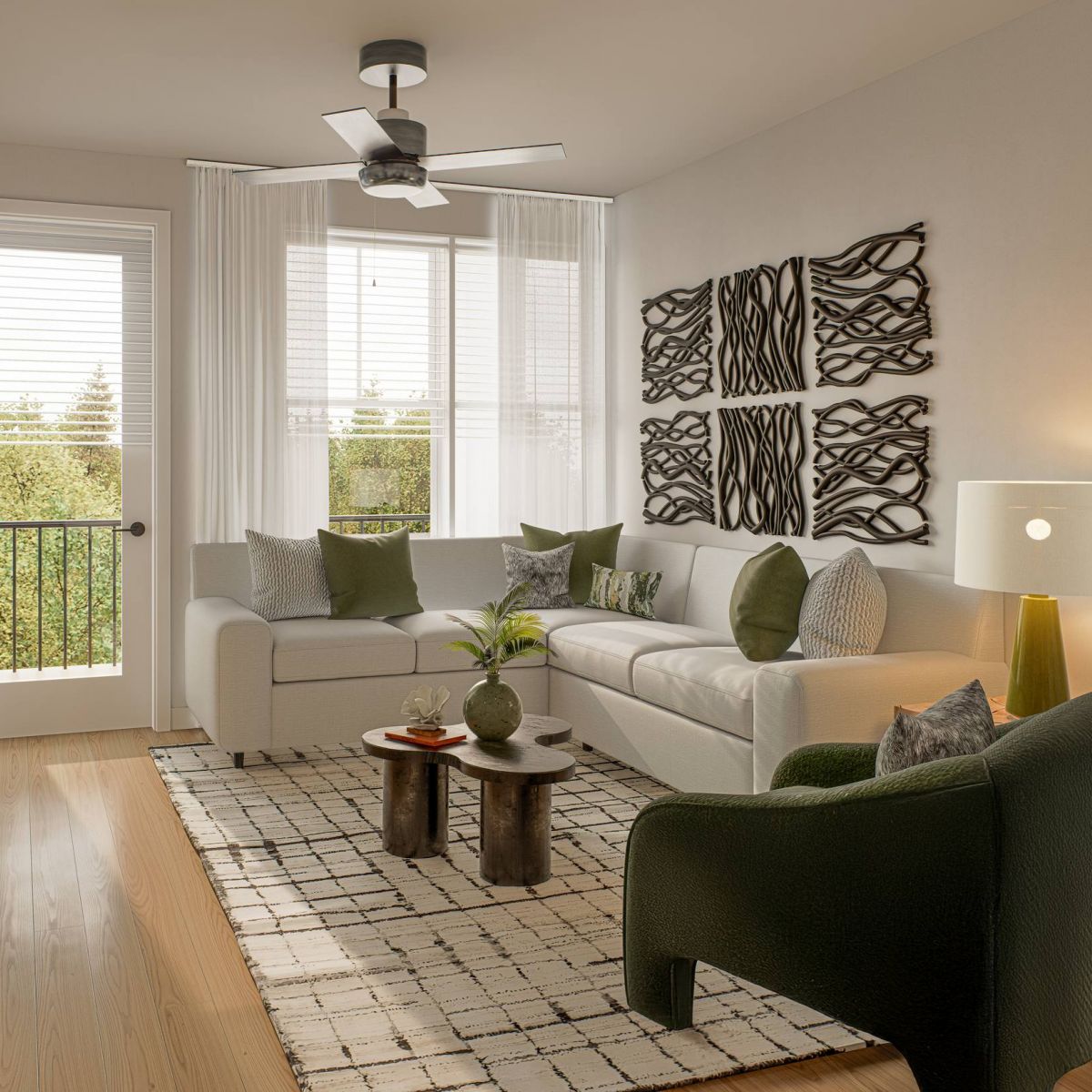 Modern living room with a white sofa, green armchair, large window, and wall art above the couch.